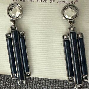 Lia Sophia geometric Art Deco-inspired design with navy blue column